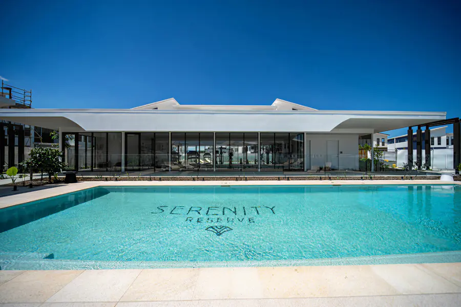 The Serenity Rec Club pavilion and its pool, the club name tiled into the pool floor